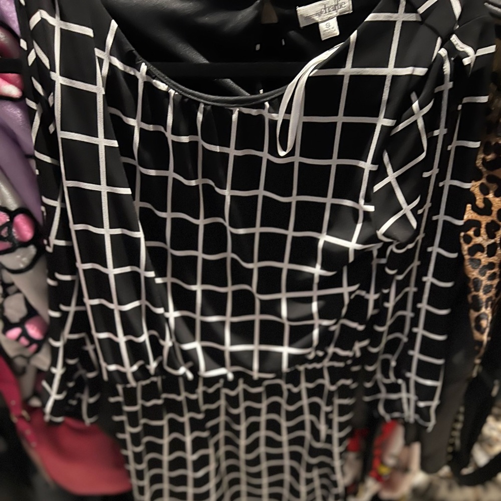 Black dress with white plaid lines
Charming Charlie
Small